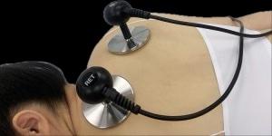Tecar Therapy device applied to patient